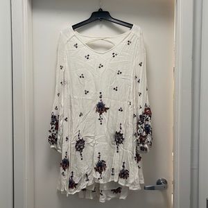 White Free People dress with blue embroidery